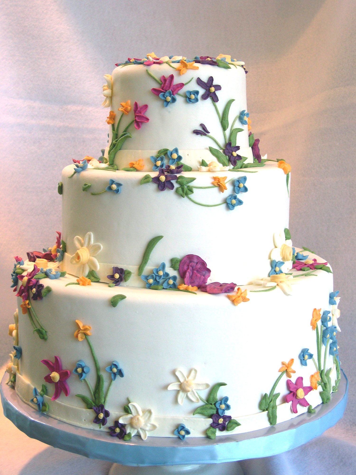 Wedding cake with hand-piped buttercream wildflowers